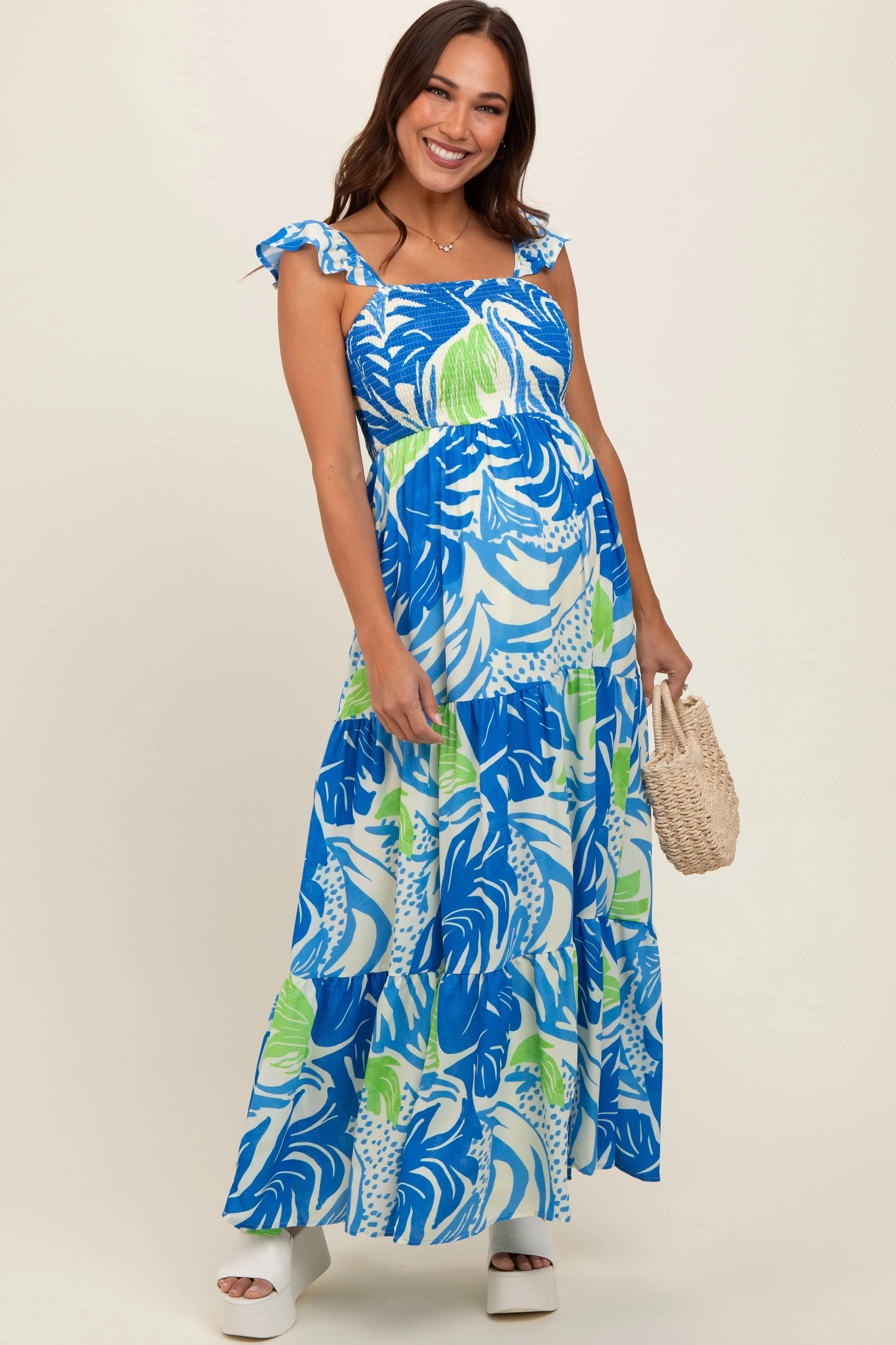 Blue Leaf Print Smocked Maternity Maxi Dress sold by Pinkblush