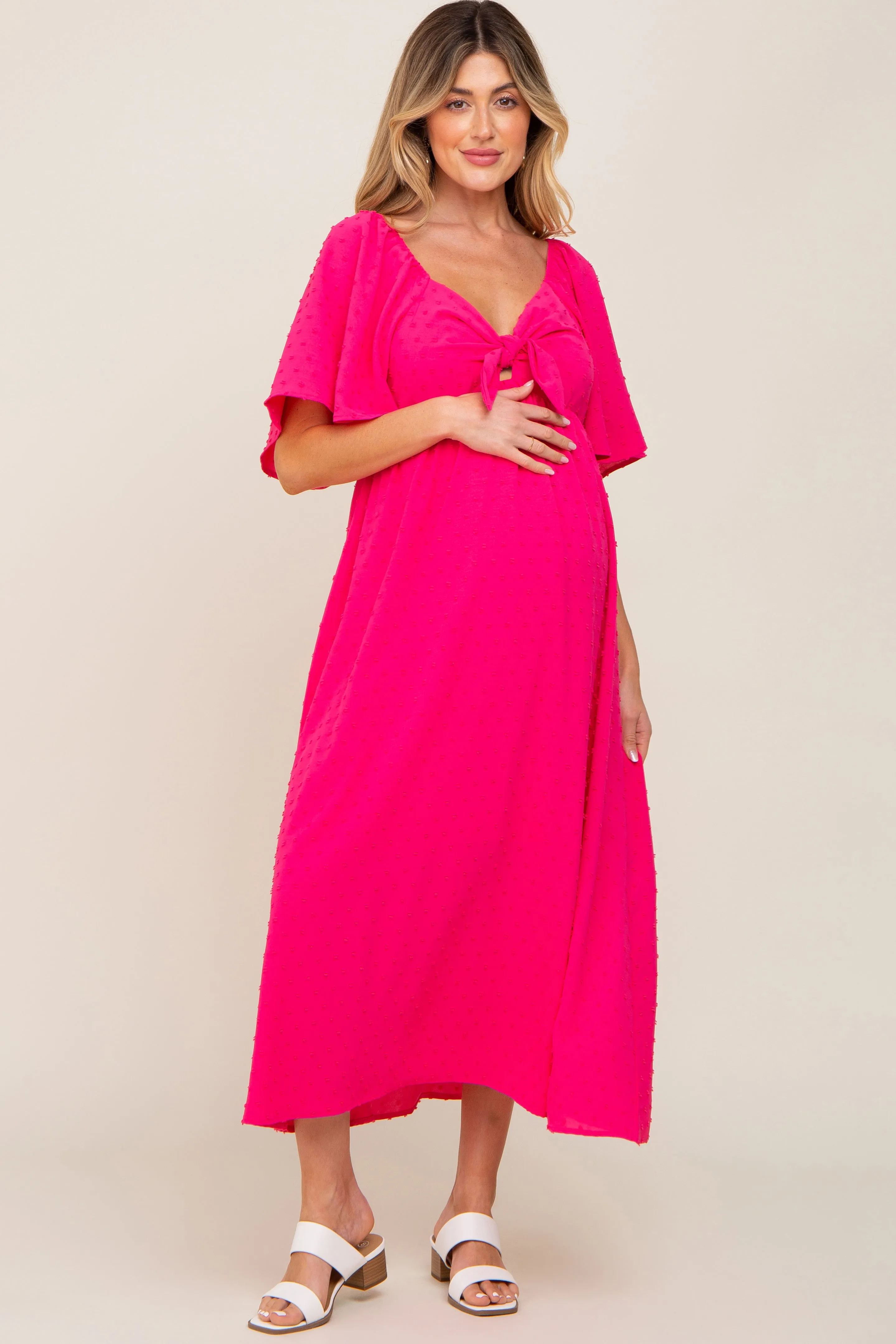Fuchsia Textured Dot Front Tie Ruffle Sleeve Maternity Midi Dress sold by Pinkblush