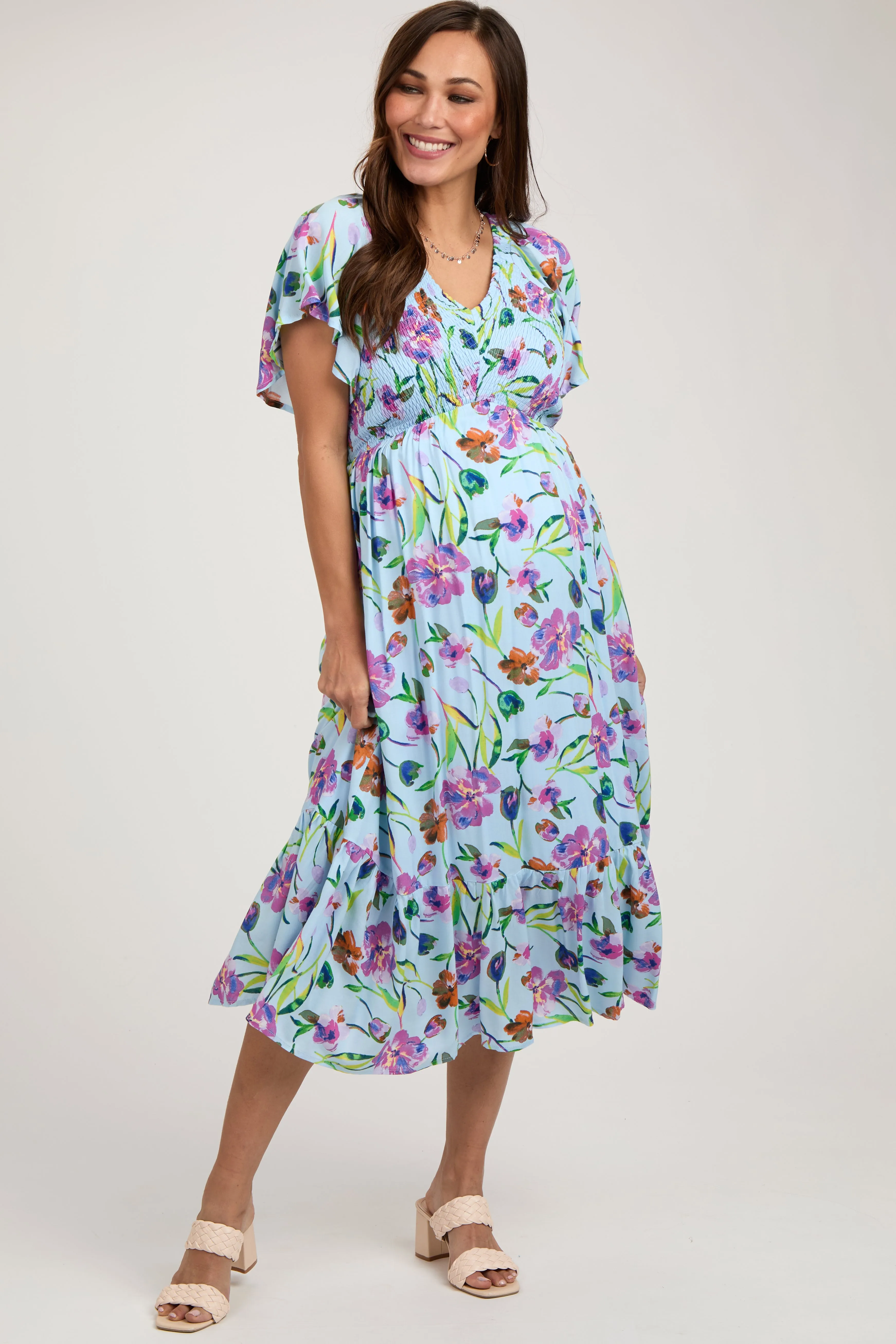 Light Blue Floral Flutter Sleeve Smocked Maternity Midi Dress sold by Pinkblush