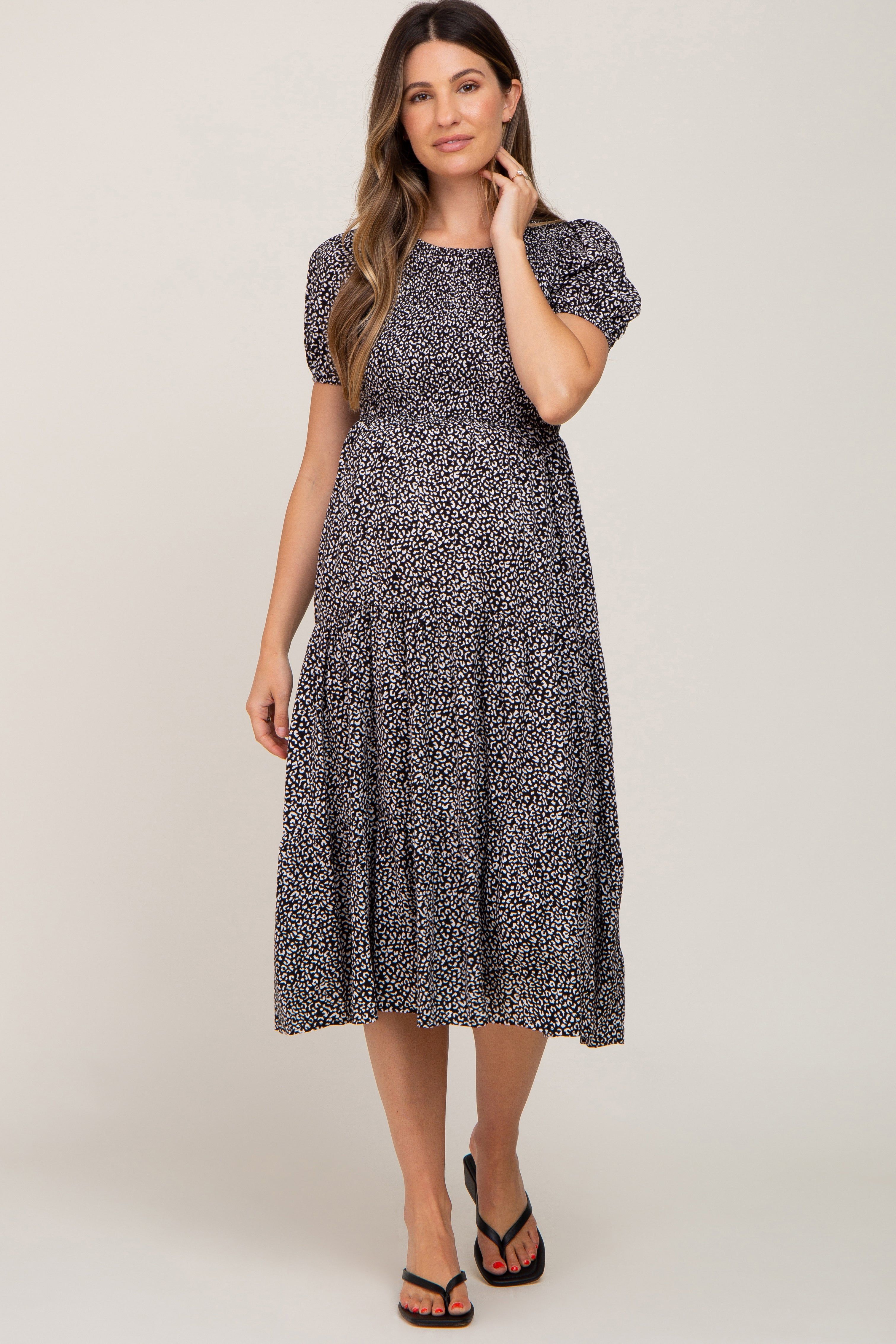 Black Animal Print Smocked Maternity Midi Dress sold by Pinkblush