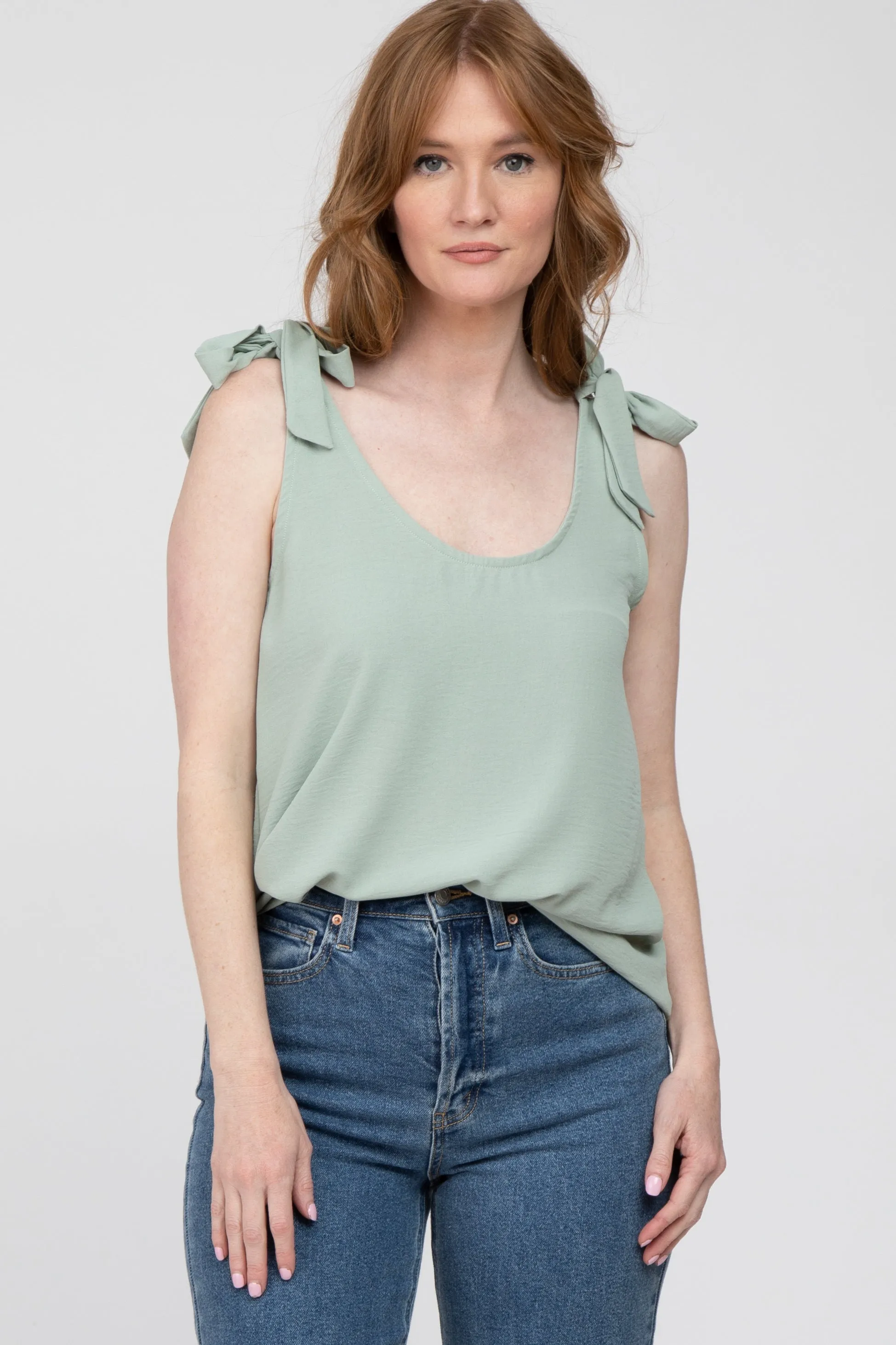 Sage Bow Shoulder Accent Sleeveless Top sold by Pinkblush