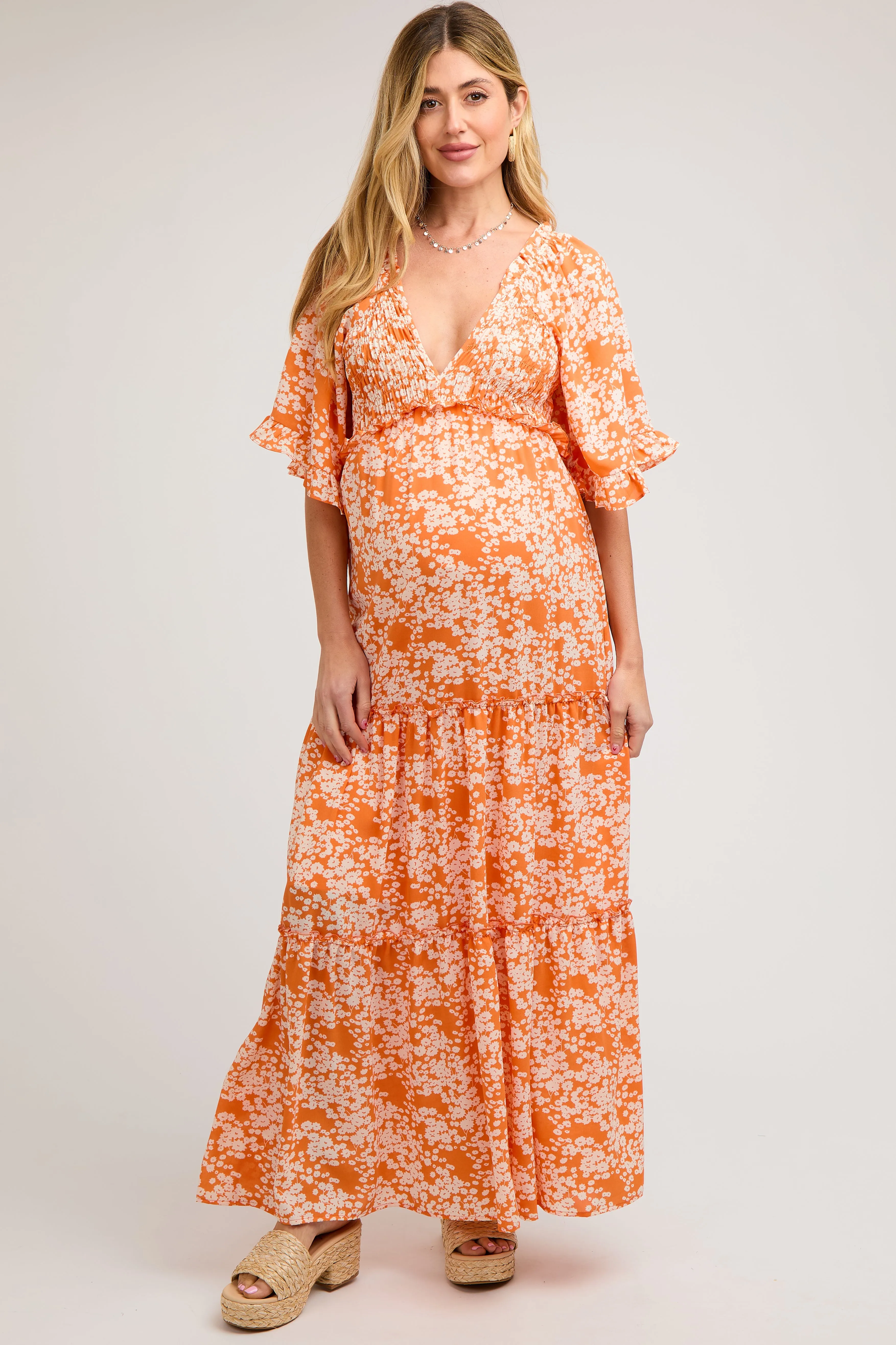 Orange Floral Smocked V-Neck Ruffle Tiered Maternity Maxi Dress sold by Pinkblush