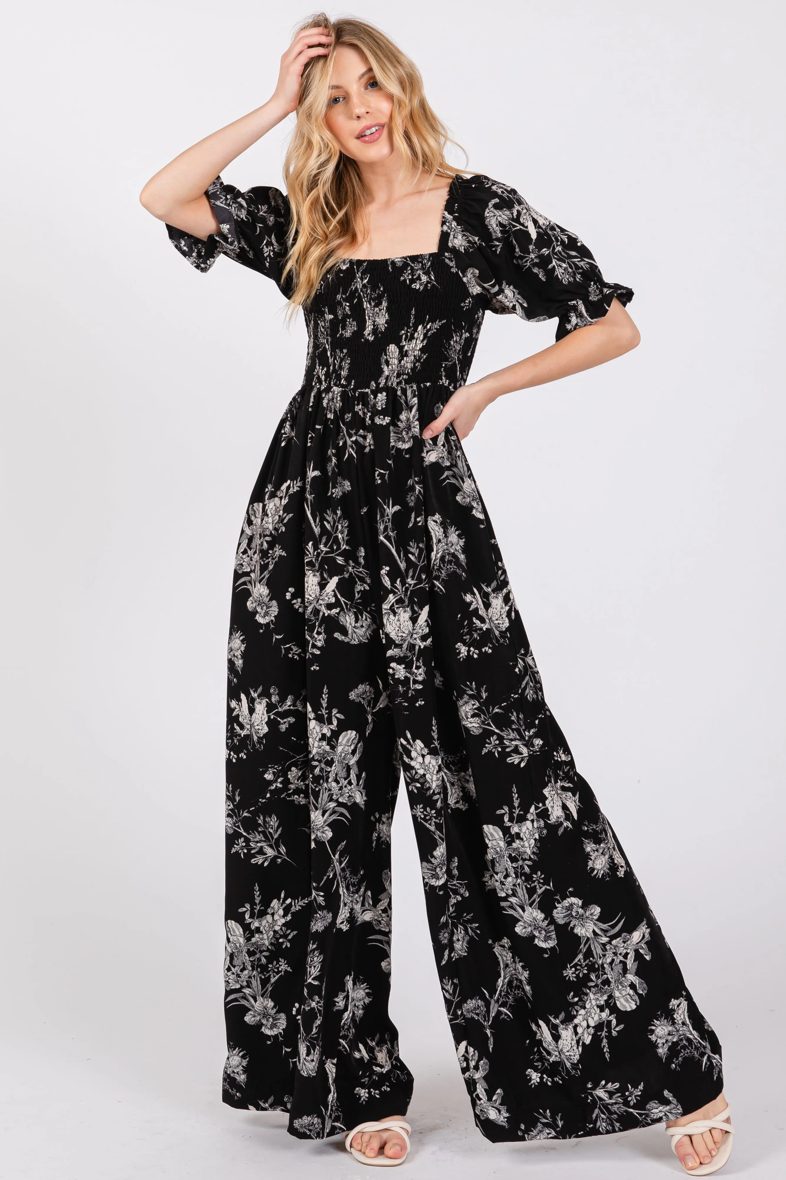 Black Floral Smocked Square Neck Wide Leg Jumpsuit sold by Pinkblush