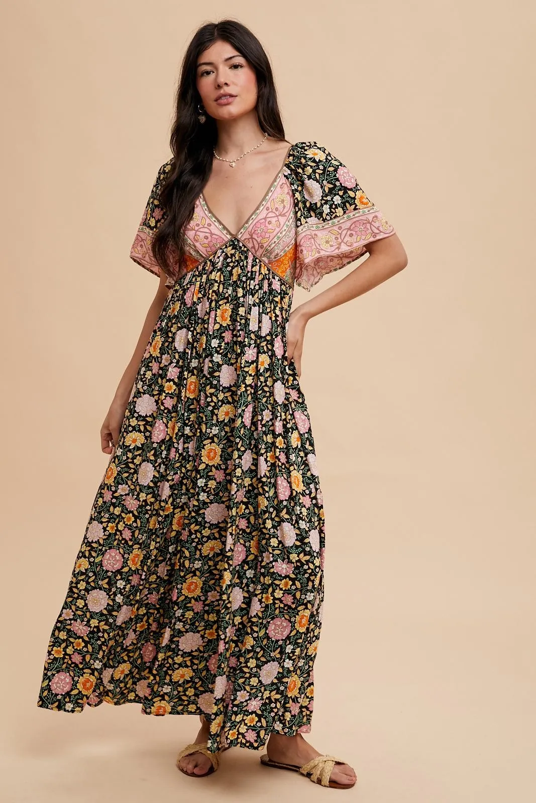 Black Floral V-Neck Short Flutter Sleeve Maxi Dress sold by Pinkblush