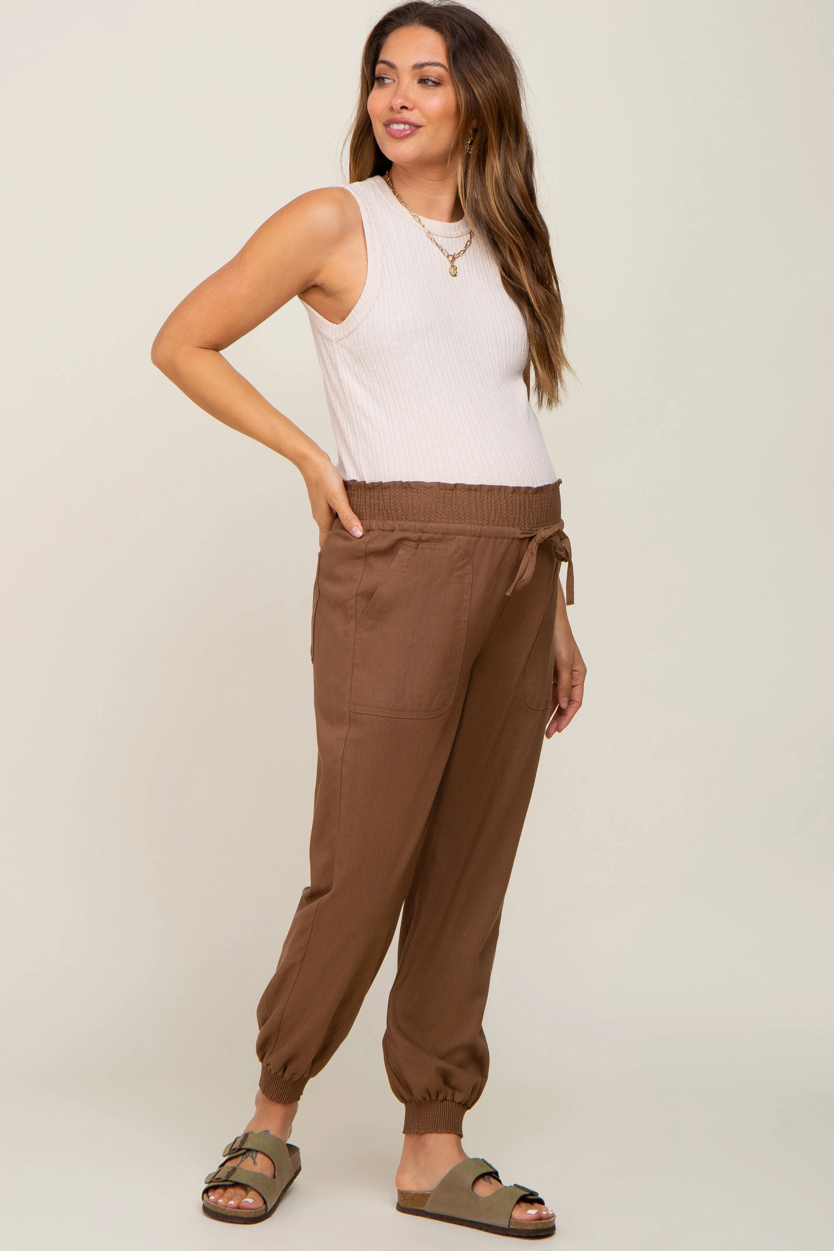 Brown Smocked Maternity Joggers sold by Pinkblush