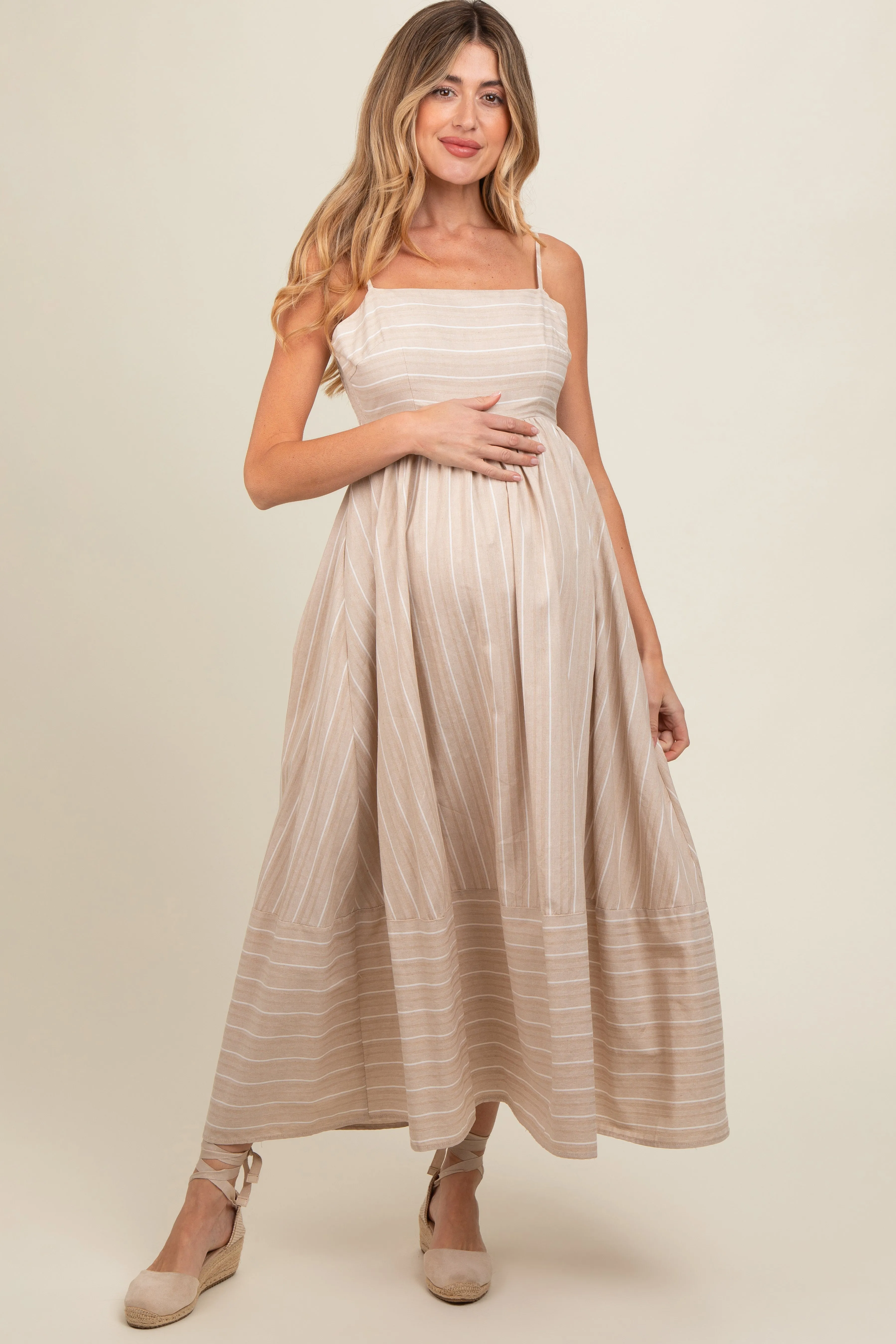Beige Striped Cutout Back Maternity Maxi Dress sold by Pinkblush
