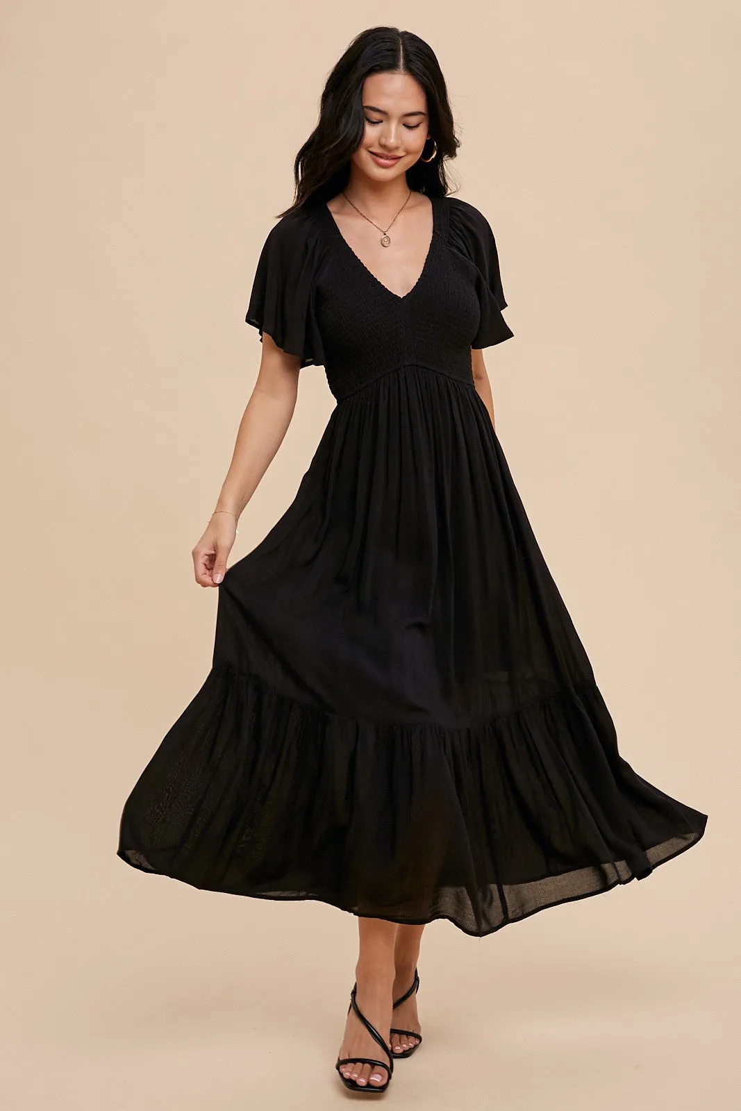 Black Smocked Flutter Sleeve Maternity Midi Dress sold by Pinkblush product image thumbnail 4