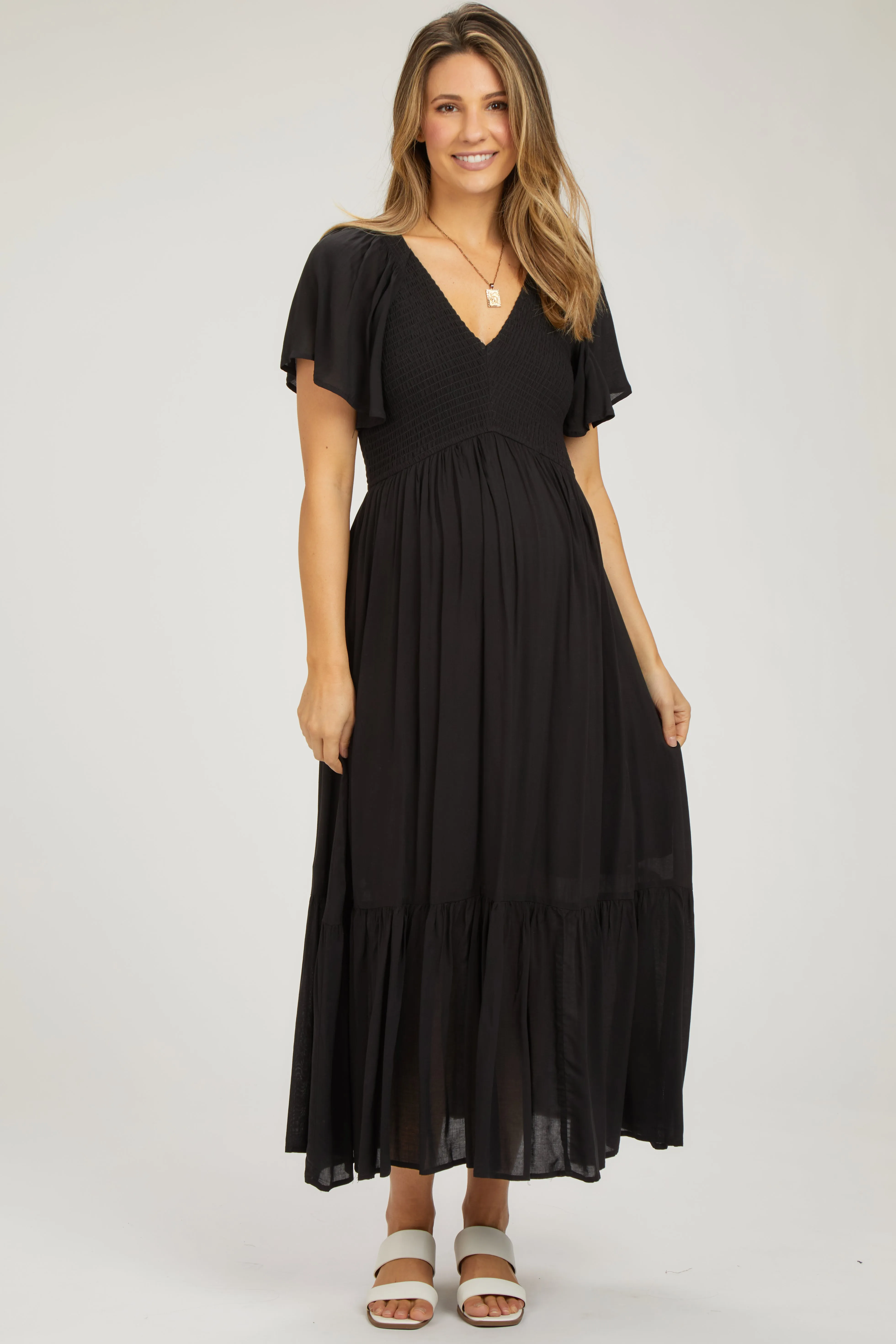 Black Smocked Flutter Sleeve Maternity Midi Dress sold by Pinkblush