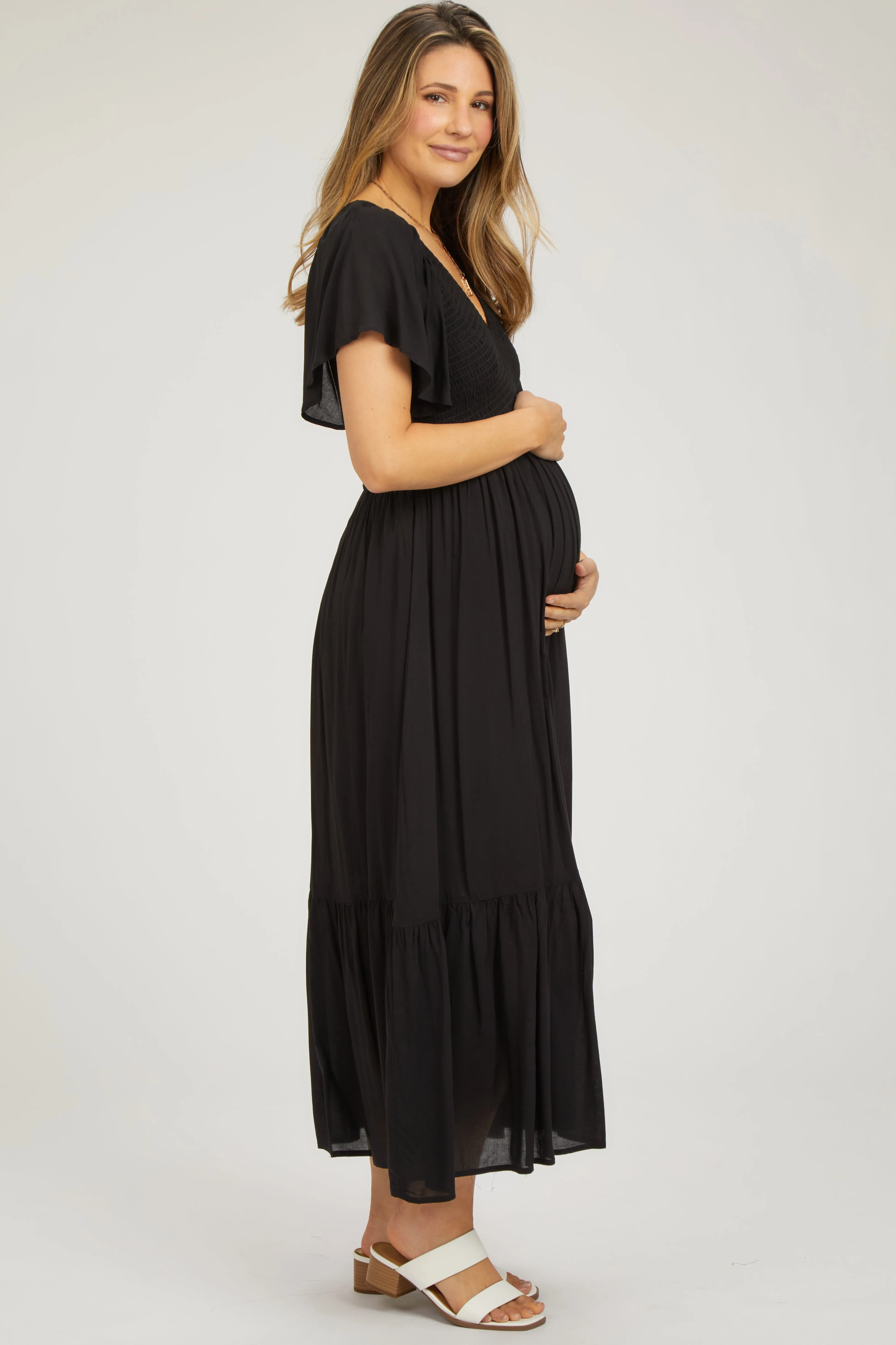 Black Smocked Flutter Sleeve Maternity Midi Dress sold by Pinkblush product image thumbnail 2