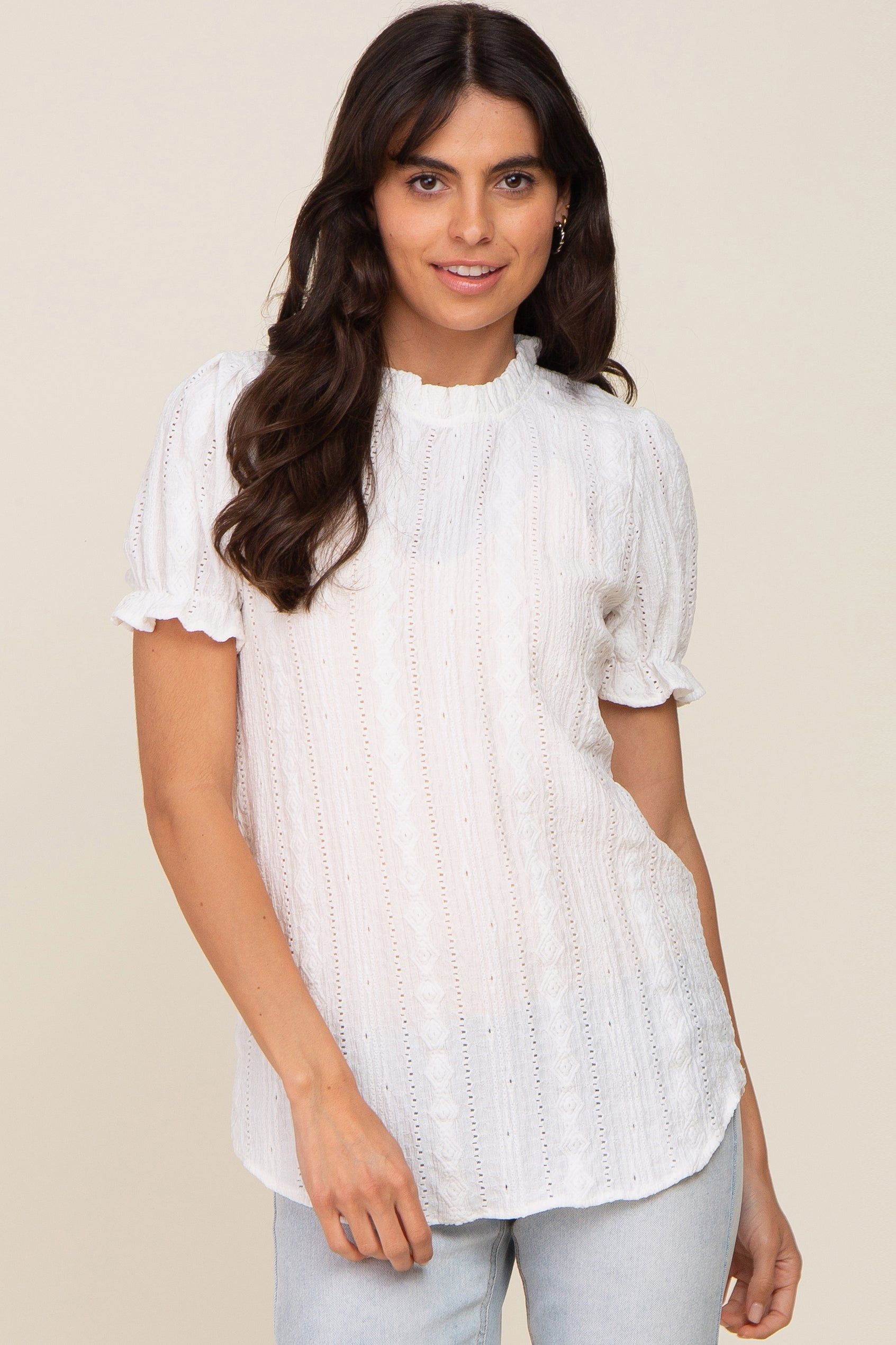 Ivory Eyelet Textured Mock Neck Top sold by Pinkblush