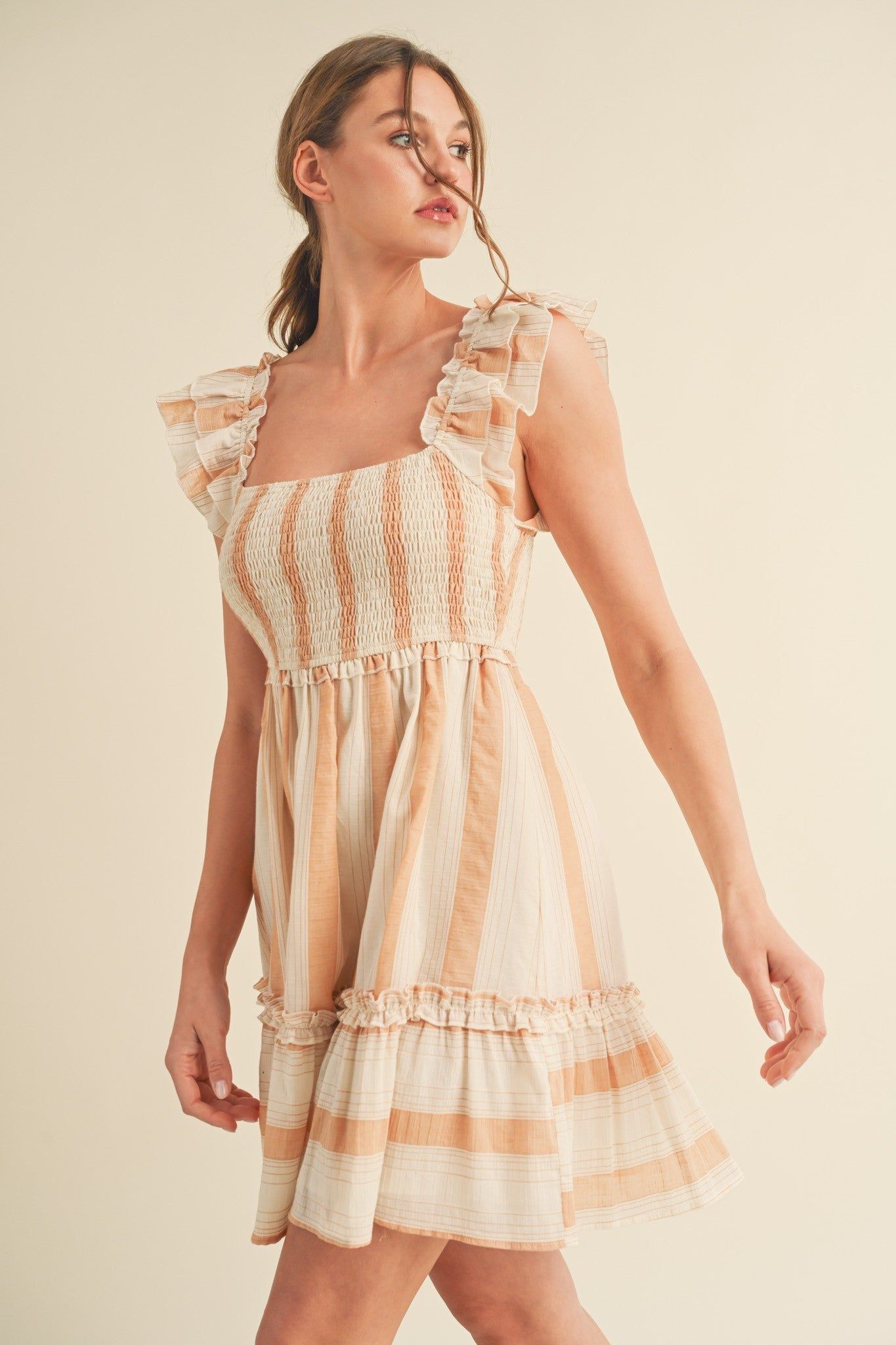 Sand Layered Flutter Sleeve Striped Mini Dress sold by Pinkblush