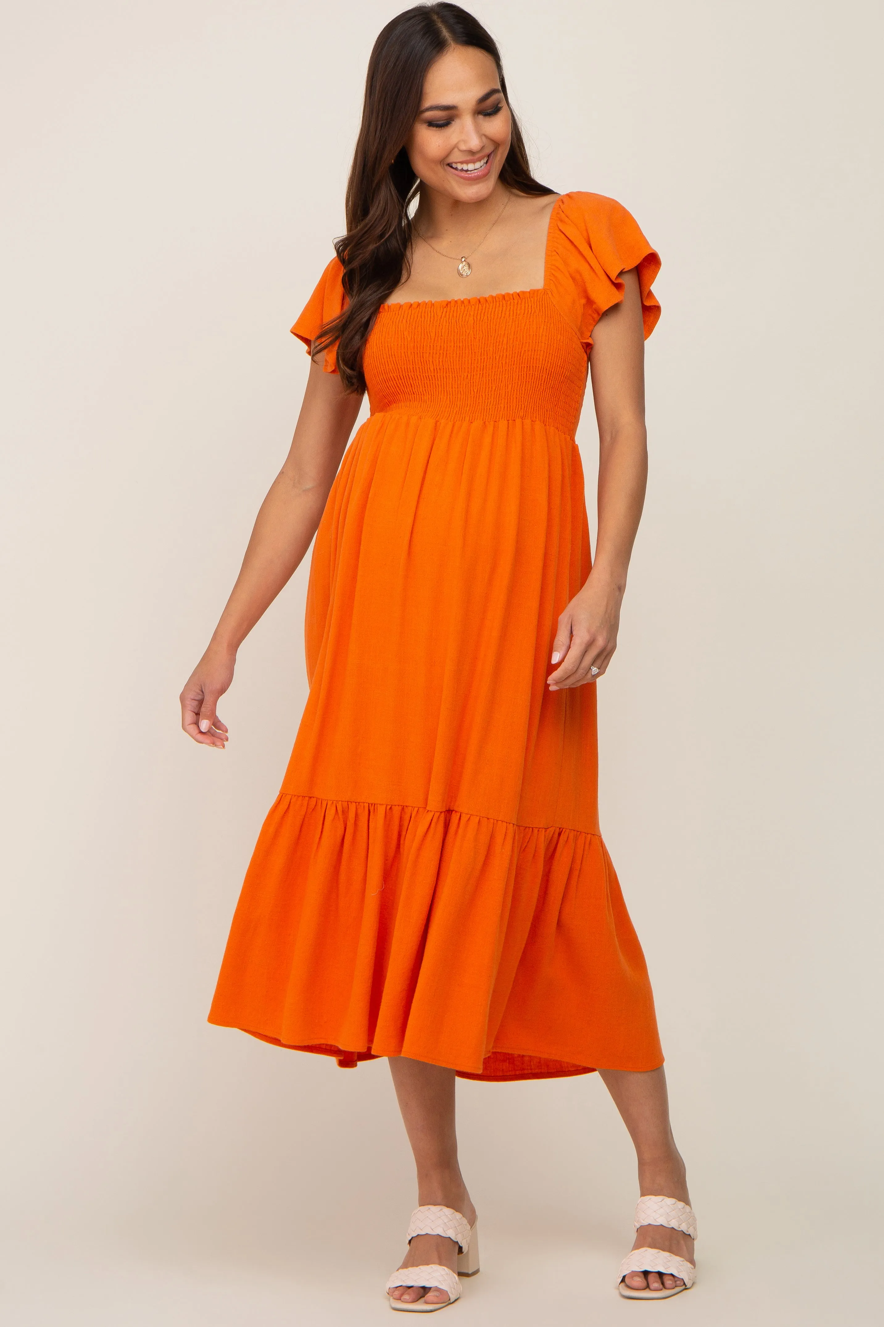 Orange Smocked Ruffle Hem Maternity Midi Dress sold by Pinkblush product image thumbnail 4