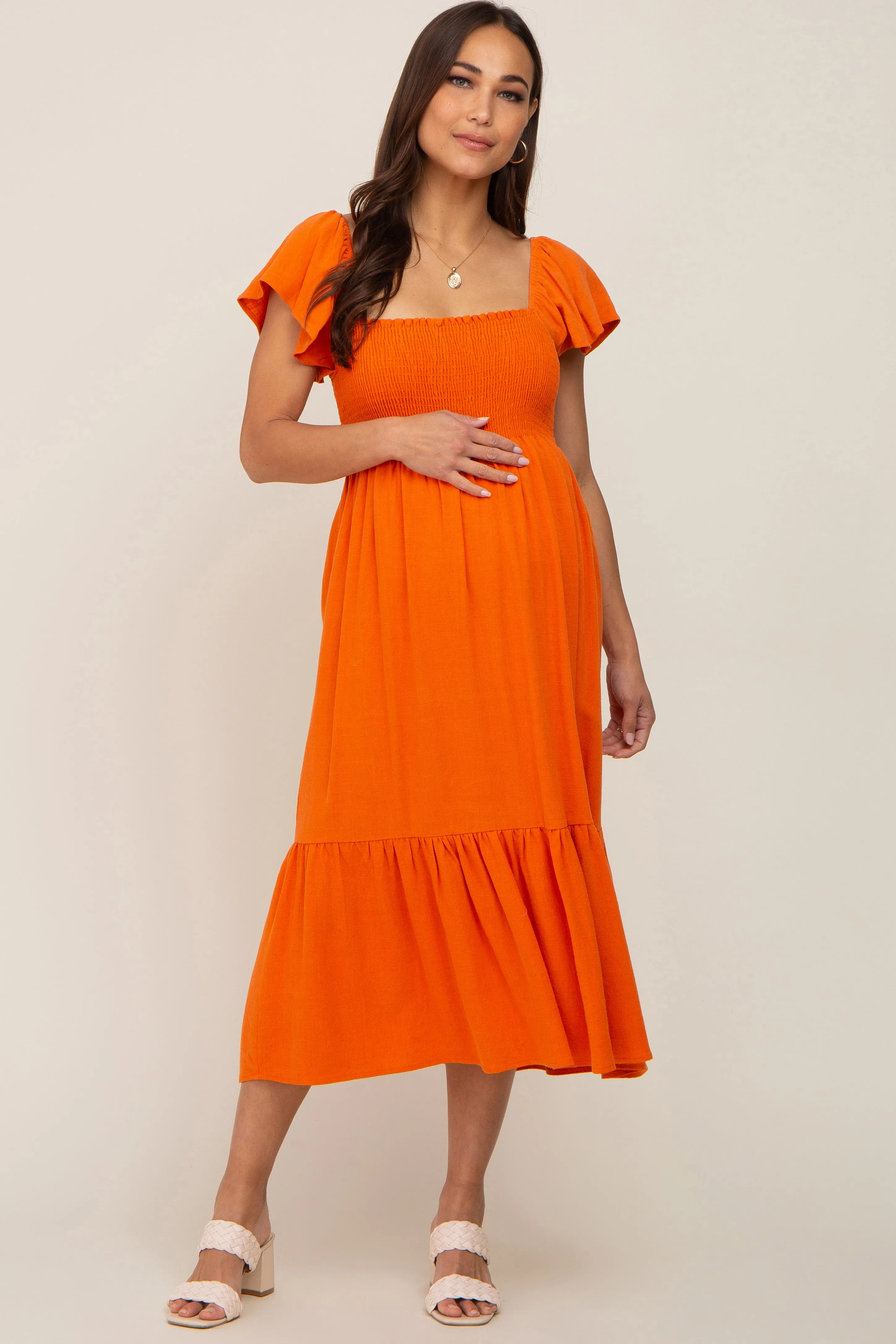 Orange Smocked Ruffle Hem Maternity Midi Dress sold by Pinkblush