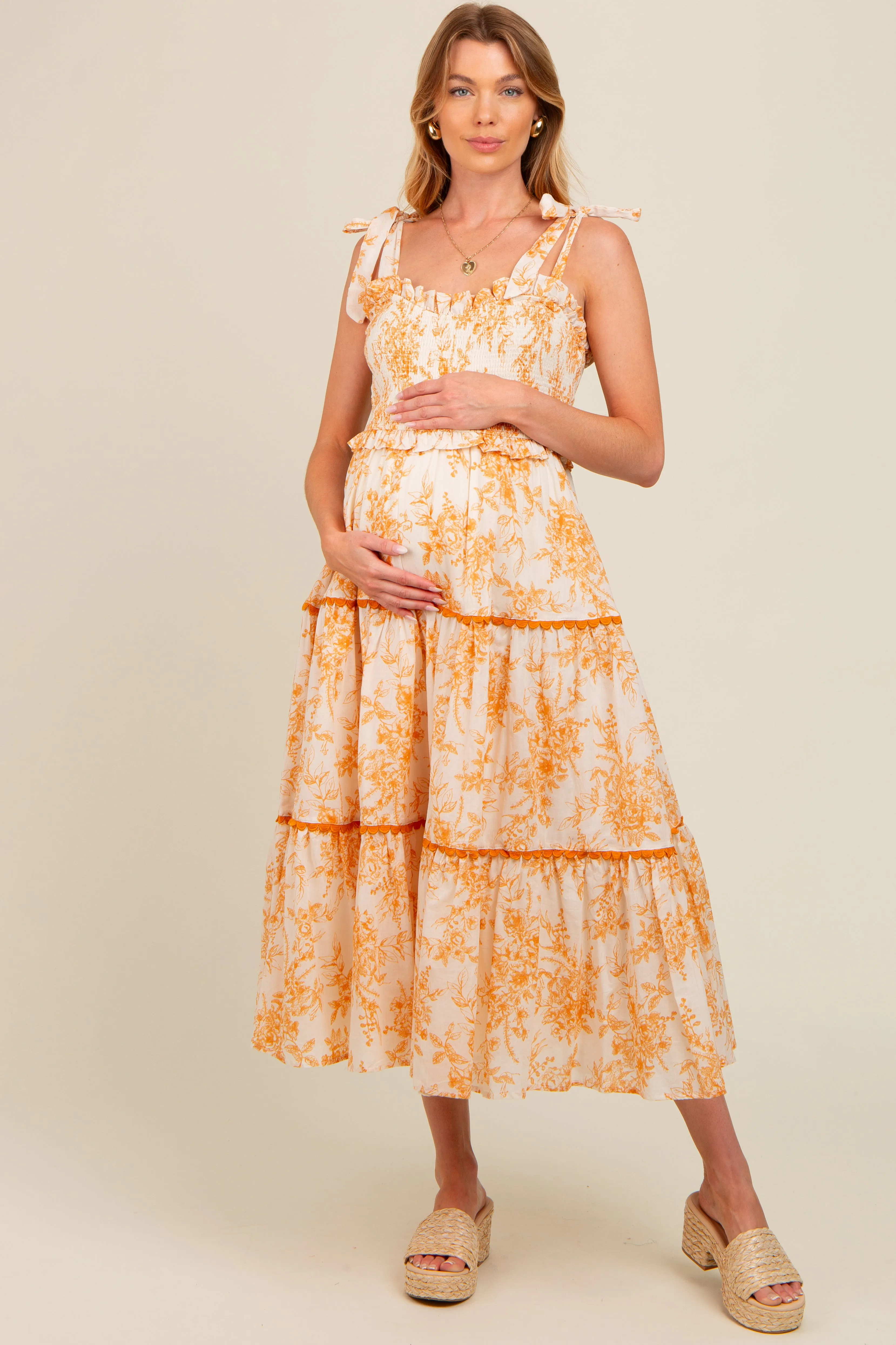 Peach Floral Sleeveless Ruffle Tiered Maternity Midi Dress sold by Pinkblush product image thumbnail 2