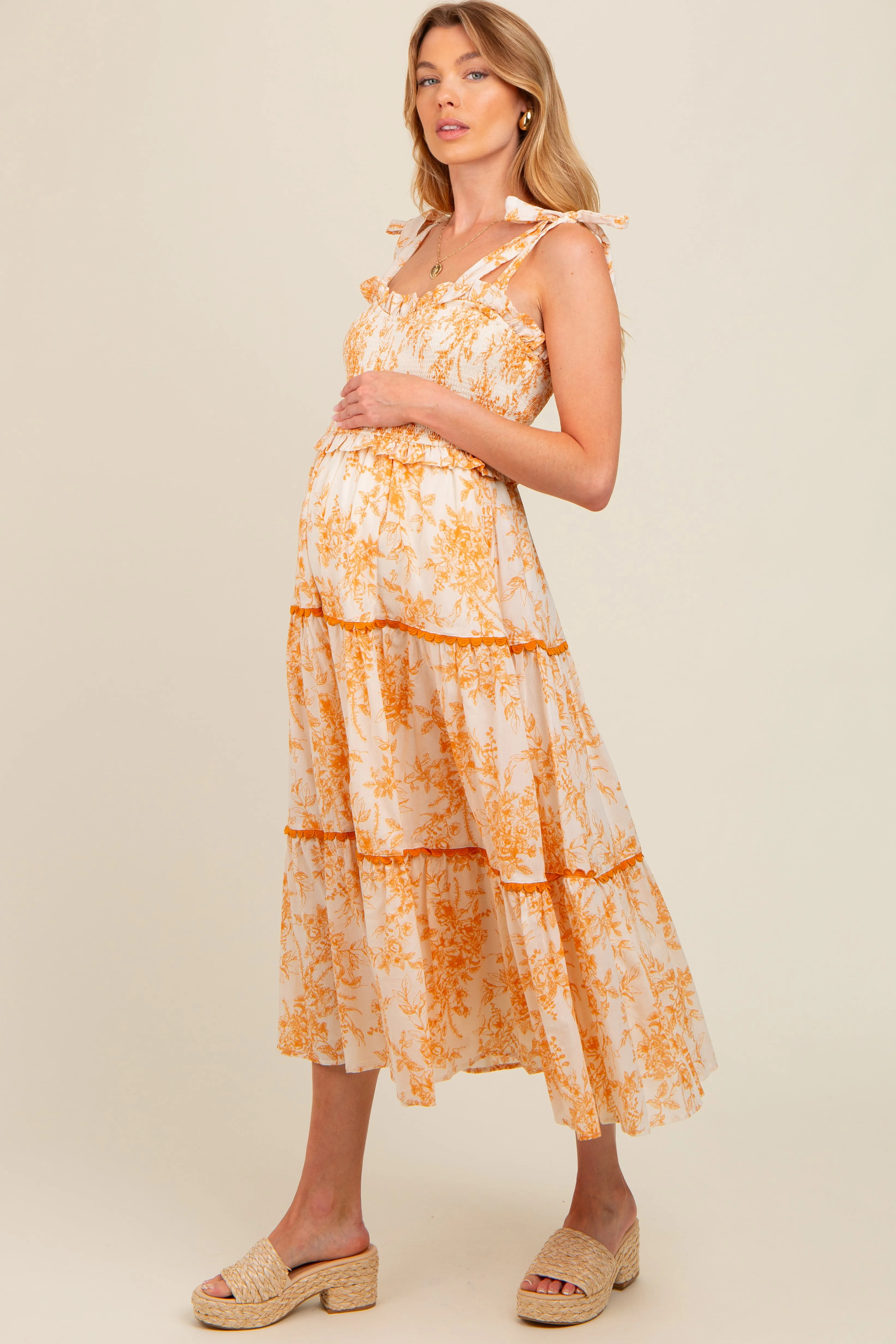 Peach Floral Sleeveless Ruffle Tiered Maternity Midi Dress sold by Pinkblush