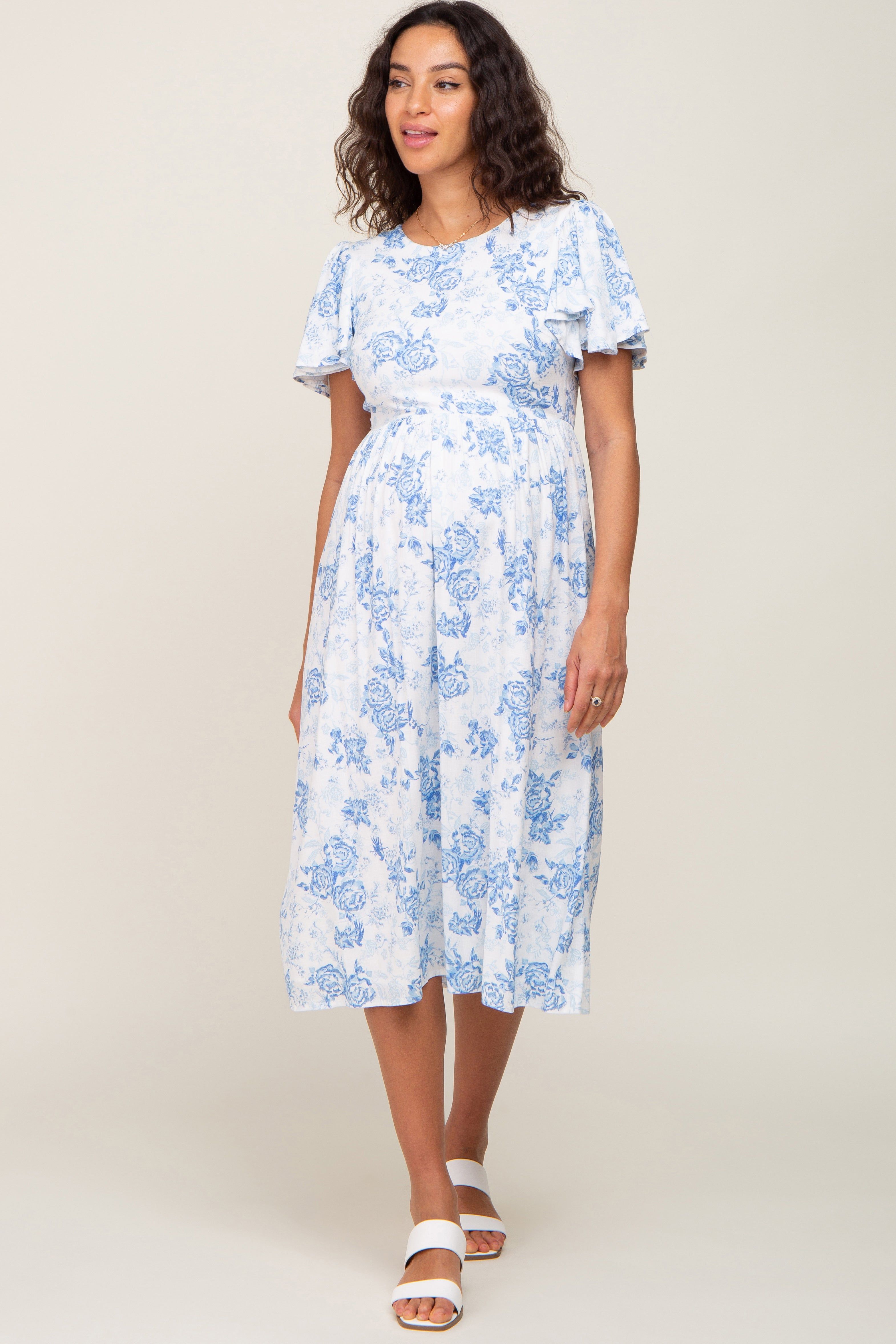 White Floral Short Flutter Sleeve Back Cutout Maternity Midi Dress sold by Pinkblush