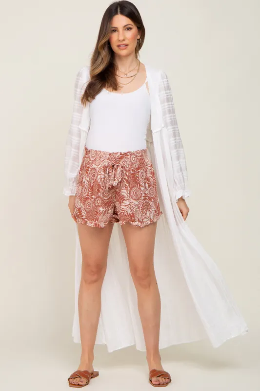 Rust Floral Ruffle Accent Maternity Shorts sold by Pinkblush