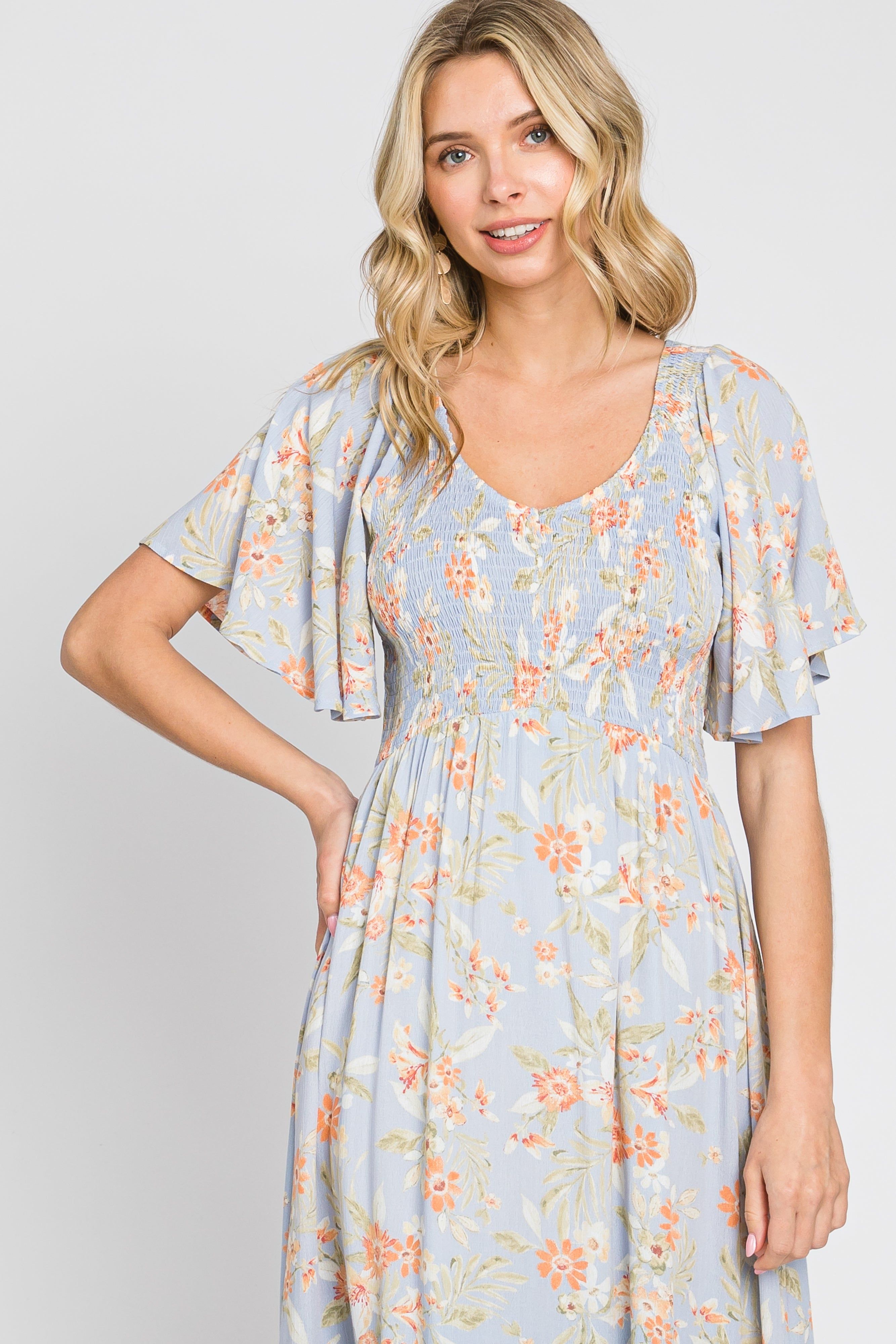Light Blue Floral Smocked V-Neck Short Sleeve Midi Dress sold by Pinkblush product image thumbnail 4