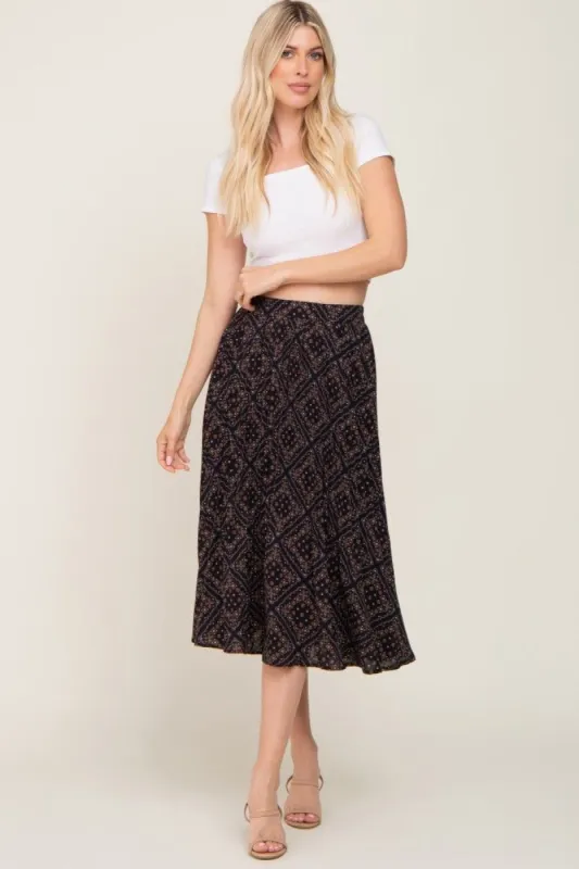 Black Printed Pleated Midi Skirt sold by Pinkblush