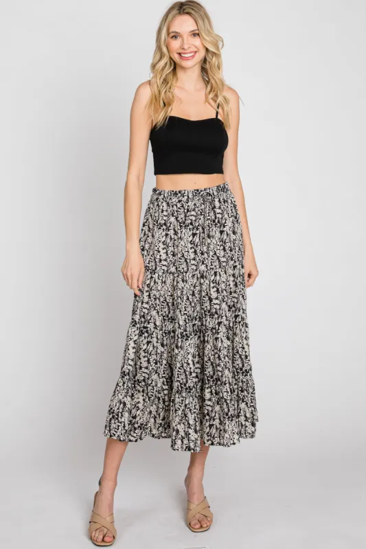 Black Leaf Print Tiered Midi Skirt sold by Pinkblush