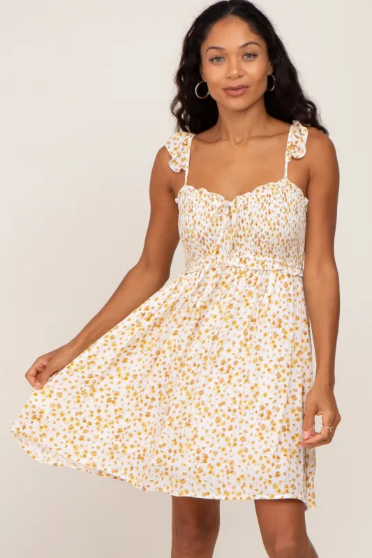 Yellow Floral Smocked Ruffle Strap Mini Dress sold by Pinkblush