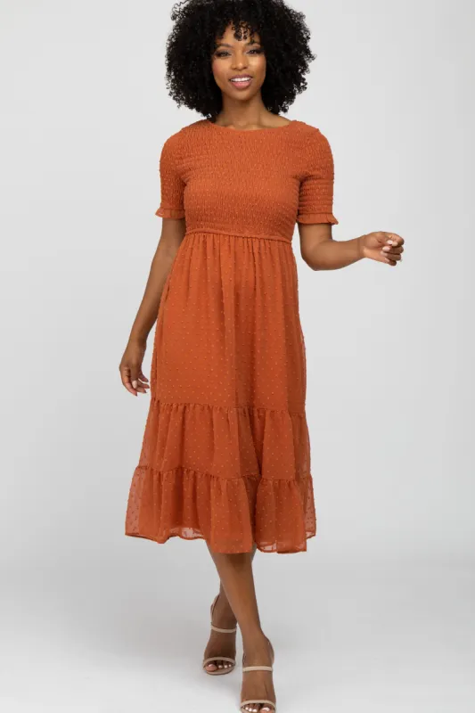 Rust Swiss Dot Smocked Midi Dress sold by Pinkblush