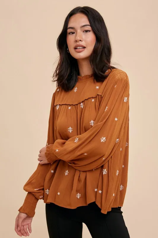 Rust Ruffled Neck Embroidered Blouse sold by Pinkblush
