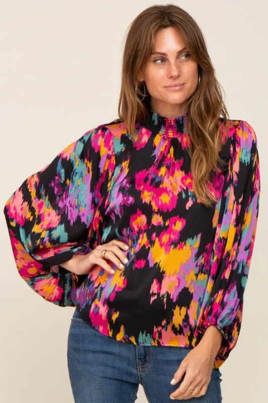 Black Abstract Smocked Mock Neck Blouse sold by Pinkblush