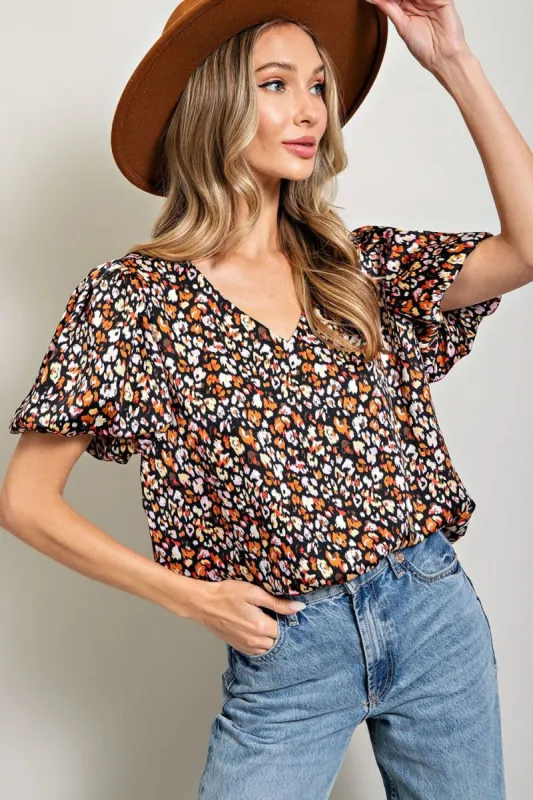 Black Animal Print Puff Sleeve Top sold by Pinkblush