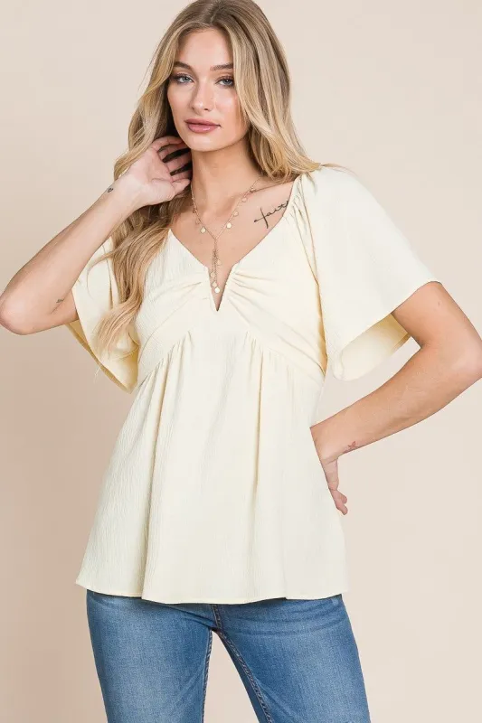 Light Yellow Split Neck Crinkled Blouse With Smocked Back sold by Pinkblush