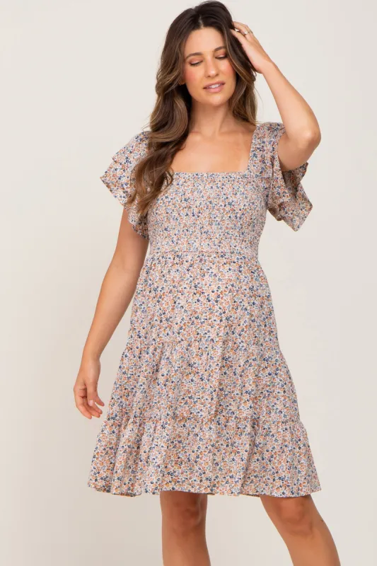 Cream Floral Smocked Tiered Maternity Dress sold by Pinkblush