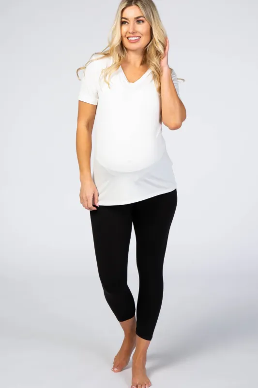 Black Belly Bandit Bump Support Capri Leggings sold by Pinkblush