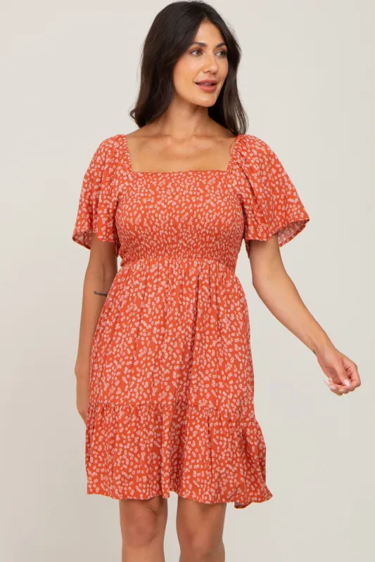 Coral Floral Smocked Dress sold by Pinkblush