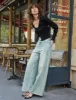 Carson Wide-Leg Faded Jeans sold by Pixie Market