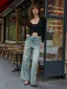 Carson Wide-Leg Faded Jeans sold by Pixie Market