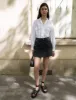 Black Denim Button Skort-BESTSELLER sold by Pixie Market