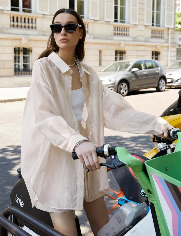 Oversized Sheer Linen-Blend Shirt in Cream made by Pixie Market