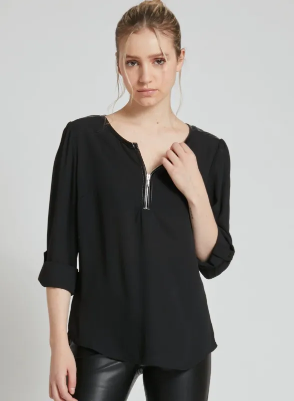 GISELE | Long sleeve blouse with zipper at neckline opening and P.U. accents. || GISELE | Chemisier à manches longues avec fermeture éclair à l'ouverture de l'encolure et P.U. accents. sold by Point Zero