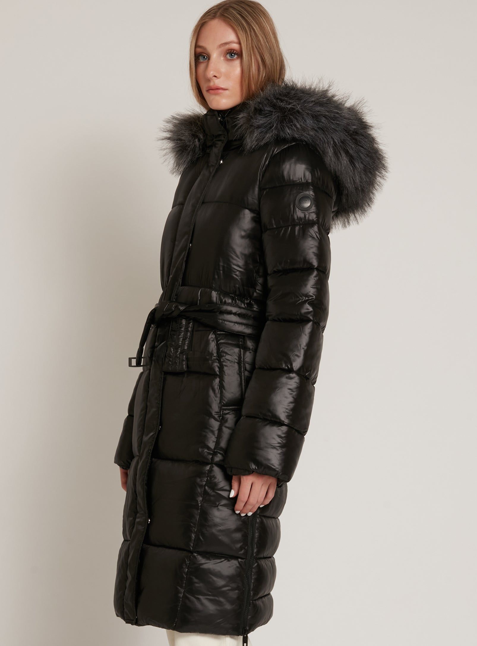 ELODIE |Maxi-length belted hooded puffer jacket || ELODIE | doudoune de longueur maxi ceinturée à capuche sold by Point Zero