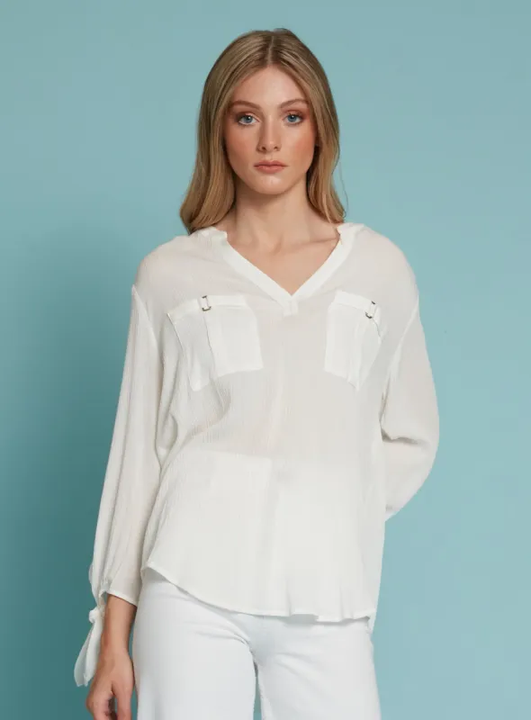 RILA | Semi-sheer white blouse || RILA | Blouse blanche semi-transparente sold by Point Zero
