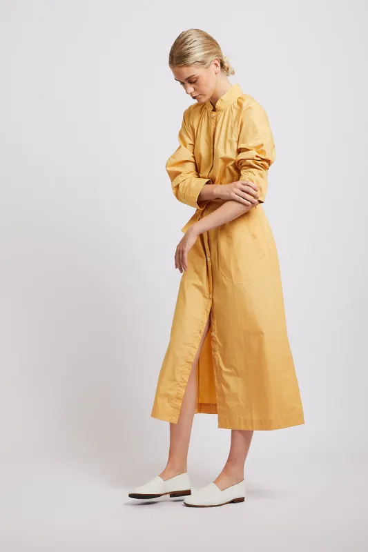 Audrey dress gold camel sold by Poleci