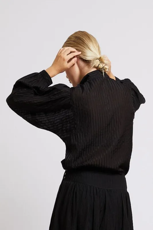 Abby shirt black sold by Poleci