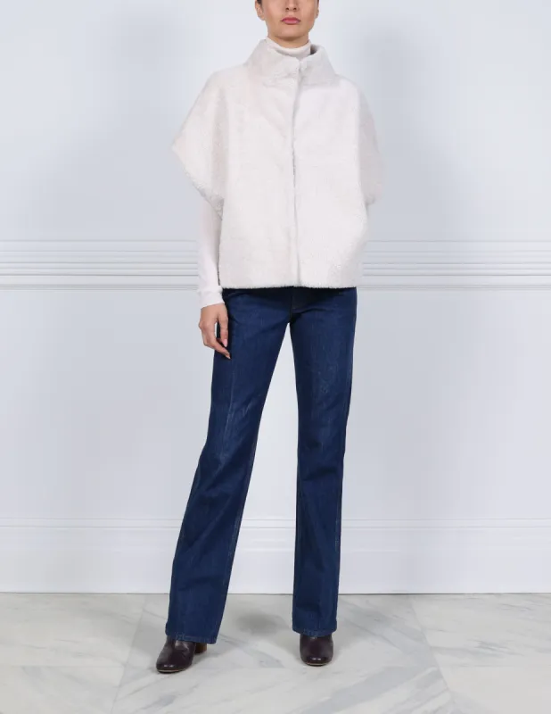 The Alyssa Curly Shearling Cocoon Vest sold by Pologeorgis