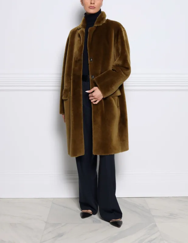 The Emmy Shearling Coat sold by Pologeorgis