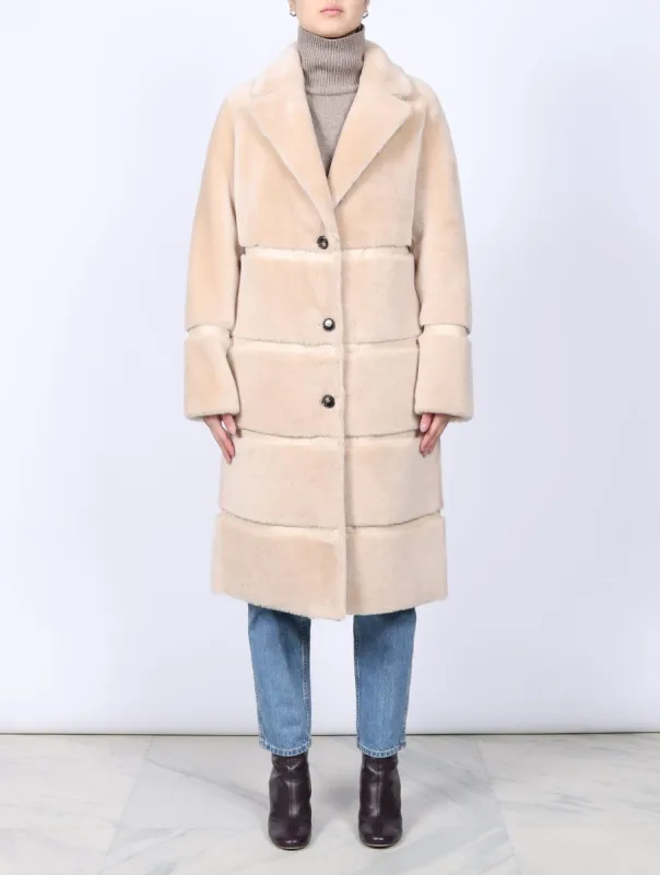 The Julia Merino Shearling Coat sold by Pologeorgis