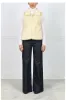 Zip Front Mink Vest in Pale Yellow sold by Pologeorgis