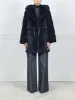 The Mallory Oversized Mink Fur Coat in Navy sold by Pologeorgis