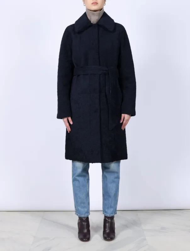The Elizabeth  Shearling Coat sold by Pologeorgis