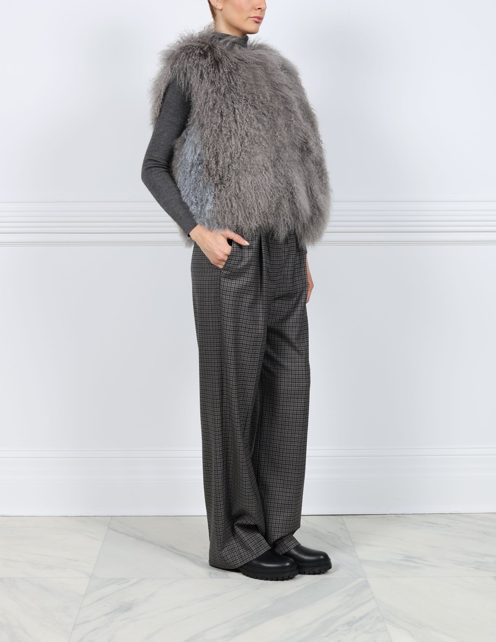 Curly Shearling Vest with Contrast Stripe sold by Pologeorgis