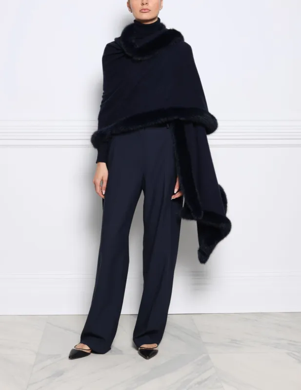The Piper Knitted Cashmere Wrap with Sable Fur Trim sold by Pologeorgis